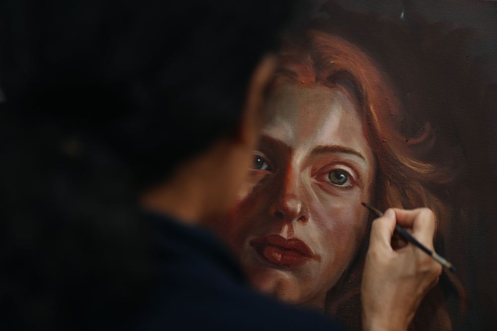 Artist at work — portrait oil painting